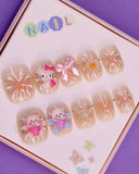 Sparkling Beige & Pastel Bear Fantasy Press-On Nails for Kids – Featuring Adorable Bow, Bear, Starfish, and Hello Kitty 3D Charms (Ages 4-16)