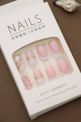 Blush Elegance: Soft Pink Nails with Delicate Gold Stripes and Star Accents – A Classic Yet Glamorous Look for Everyday or Special Occasions!