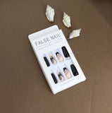 Elegant Black and Nude Press-On Nails – Floral and Line Art Design for a Sophisticated Look