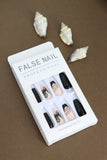 Elegant Black and Nude Press-On Nails – Floral and Line Art Design for a Sophisticated Look