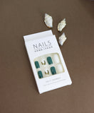 Embrace the beauty of nature with these luxurious green and white press-on nails, featuring delicate fern designs. Perfect for a classy and natural vibe!