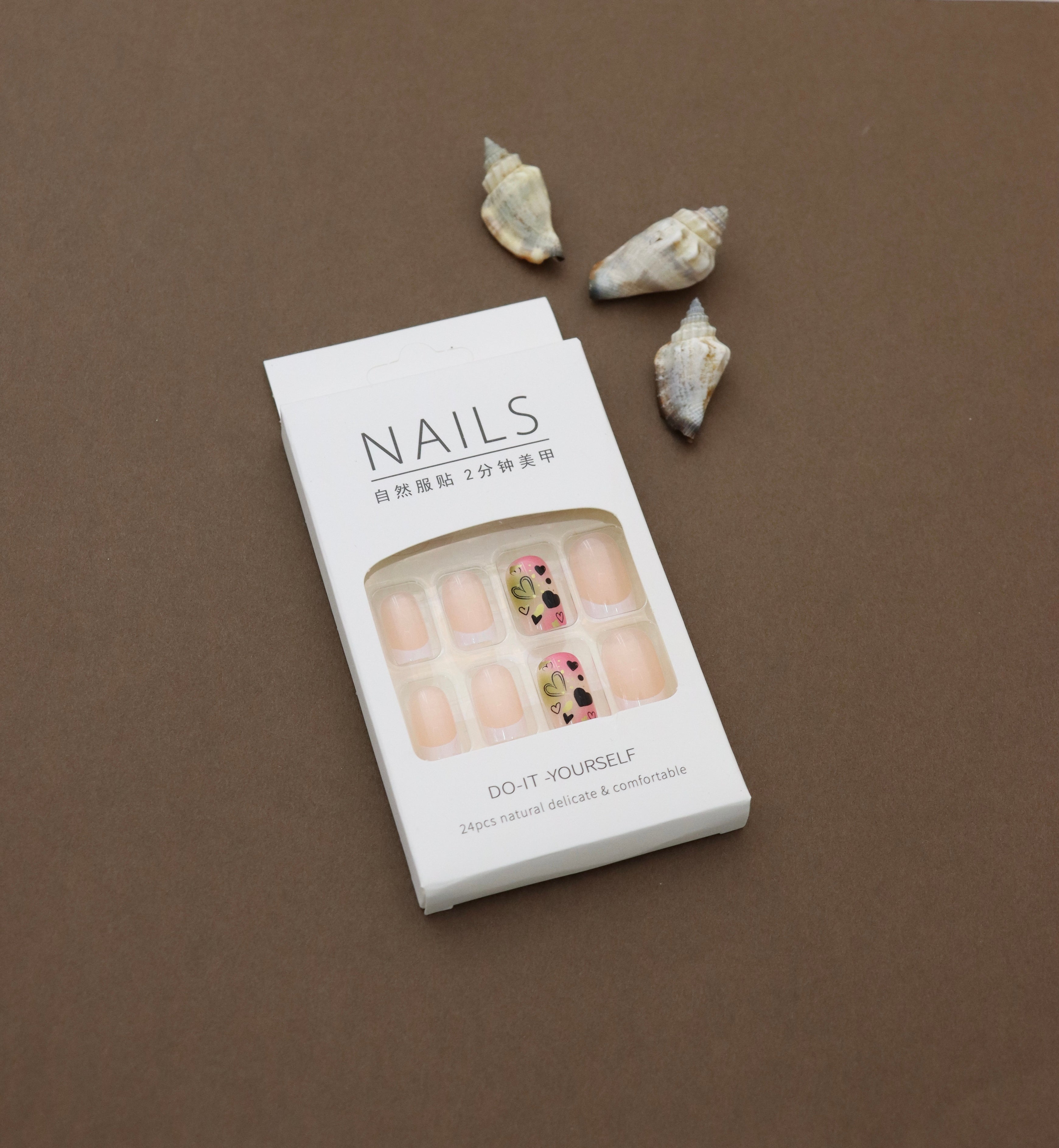 Peach Nude Press-On Nails with Gradient Pink and Yellow Heart Design
