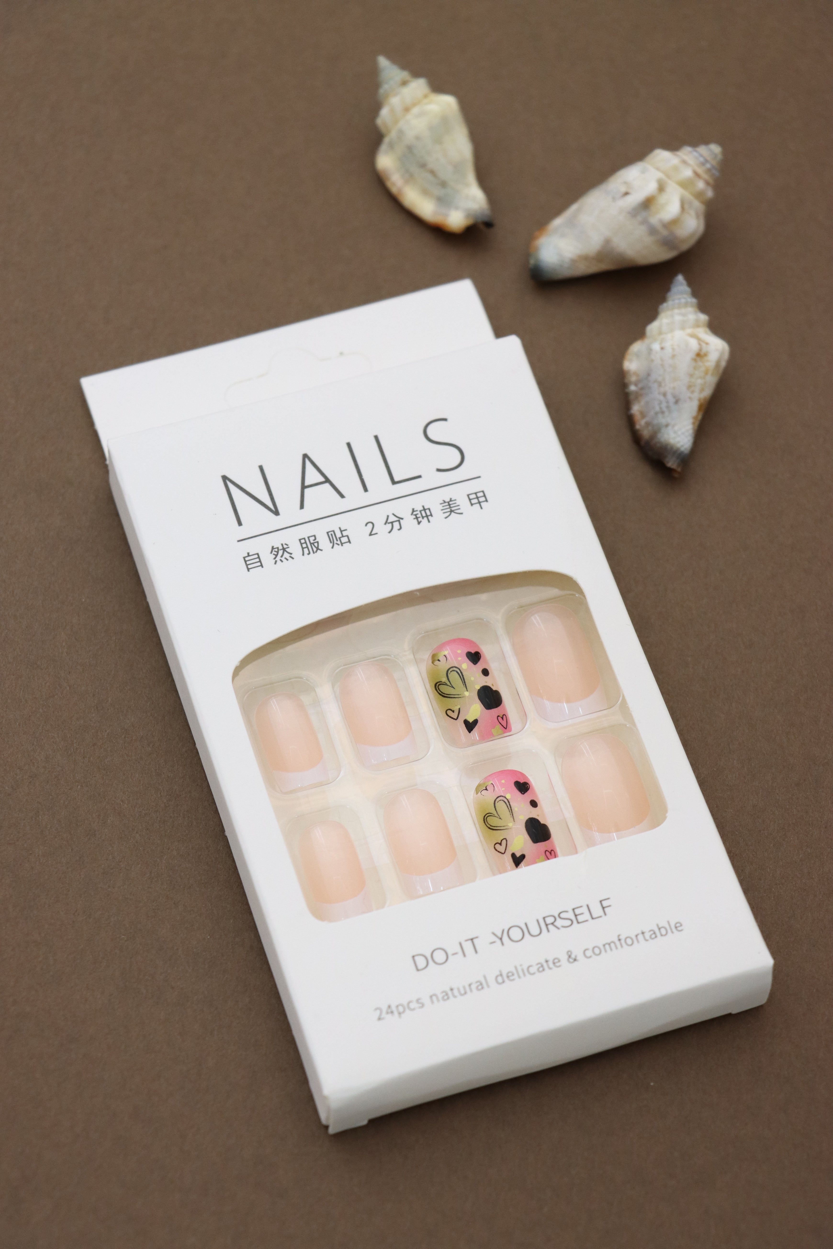 Peach Nude Press-On Nails with Gradient Pink and Yellow Heart Design