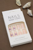 Soft Pink Press-On Nails with Purple Butterfly Accents – Whimsical Elegance