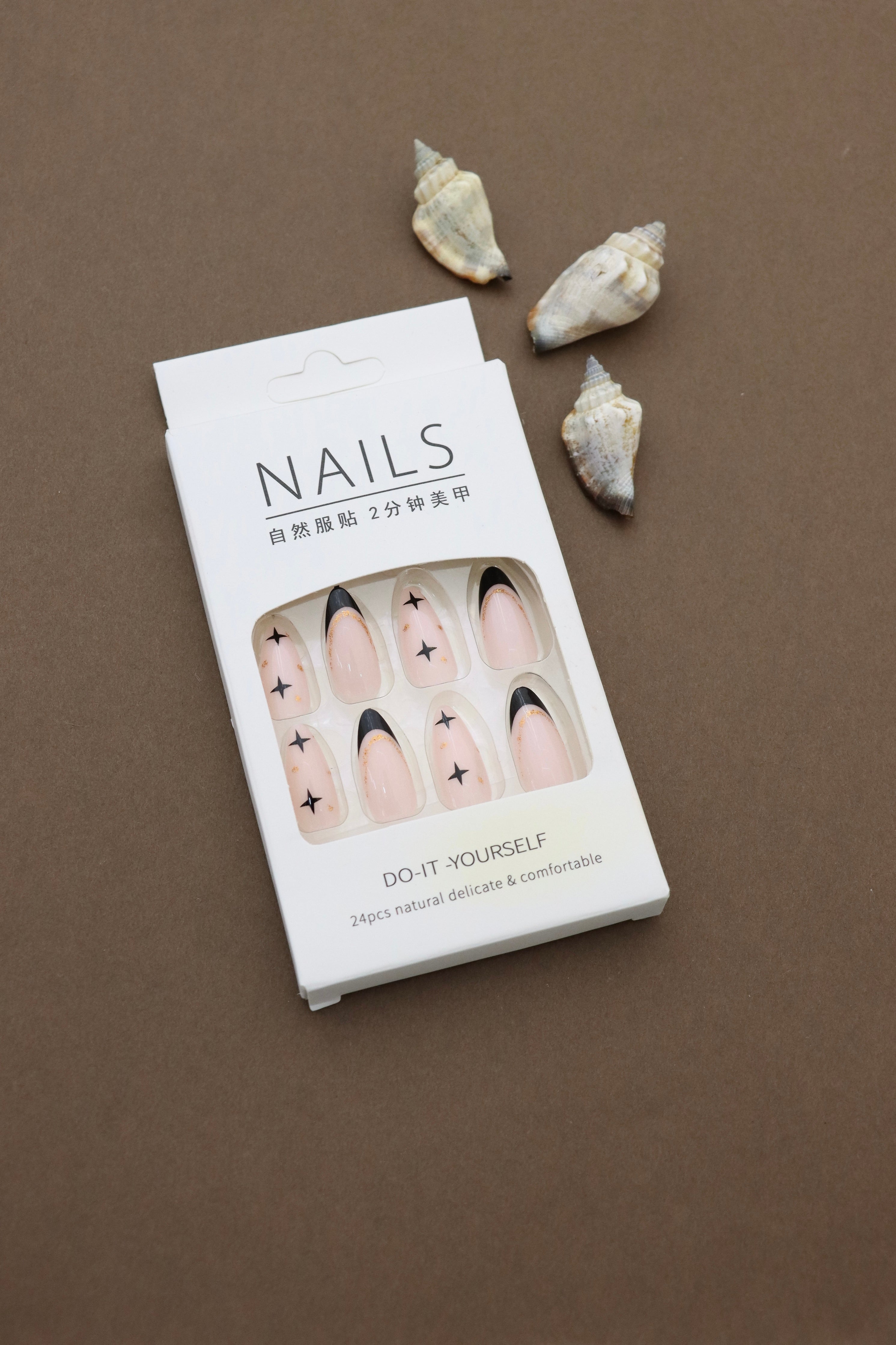 Nude Almond Press-On Nails with Black French Tips, Star Accents, and Gold Detailing - 24pcs Set