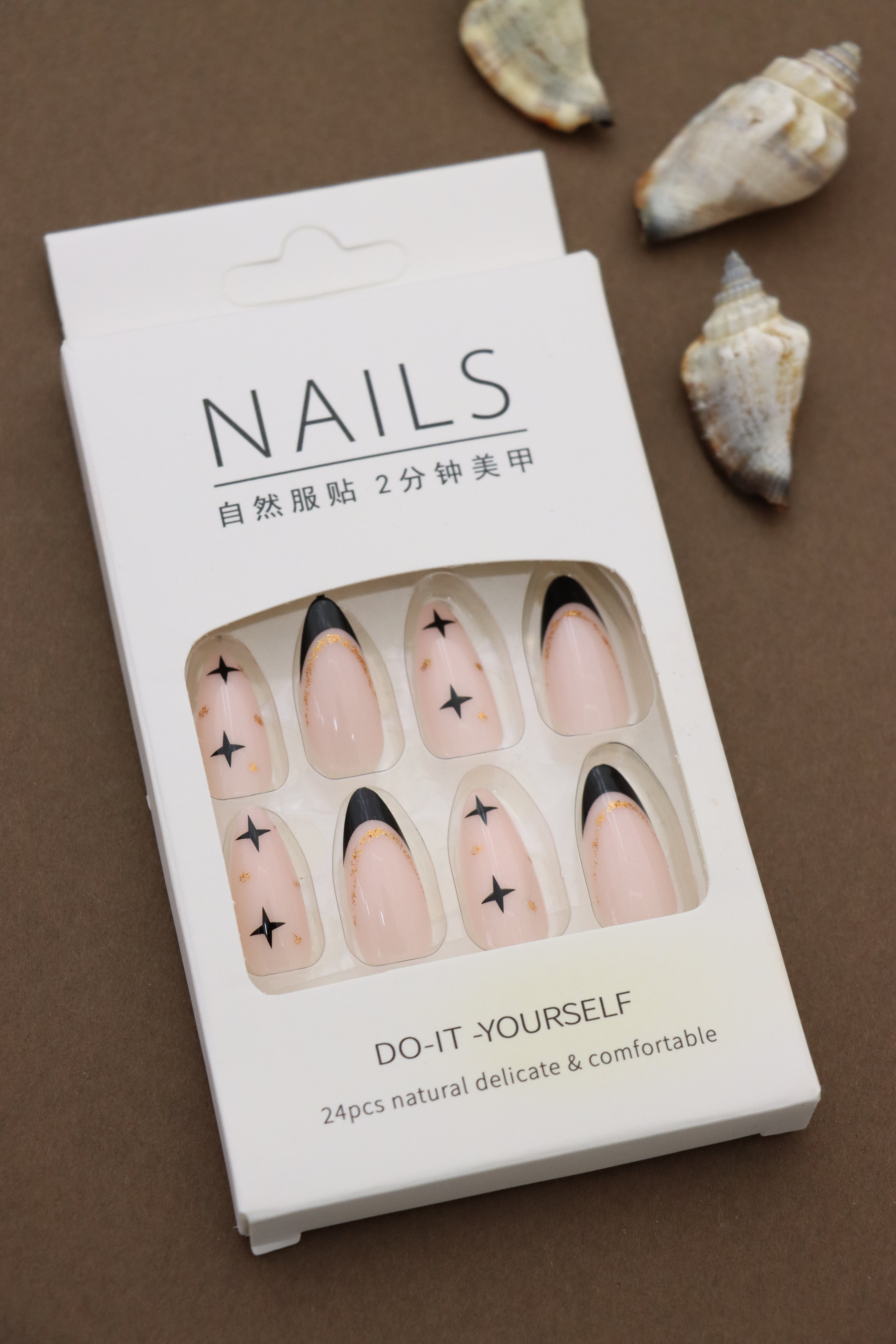 Nude Almond Press-On Nails with Black French Tips, Star Accents, and Gold Detailing - 24pcs Set