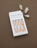 Golden Sunrise Swirl Press-On Nails with Orange and Gold Accents - Professional Finish