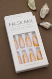 Golden Sunrise Swirl Press-On Nails with Orange and Gold Accents - Professional Finish