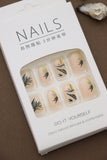 Tropical Elegance: Beige Nails with Exquisite Leafy Botanical Patterns – A Serene Touch of Nature at Your Fingertips!