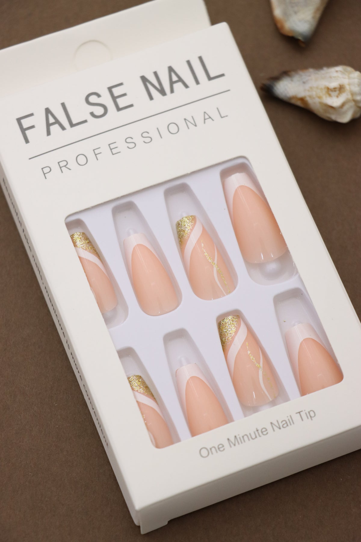 Sophisticated Glam: Elegant Almond Nails with Soft Nude Tones, Accentuated by White and Gold Swirls – Perfect for Special Occasions!