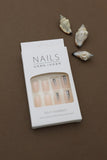Silver Ombre Glitter Nails – A Chic Fusion of Neutral Tones and Sparkling Glamour. Elevate Your Look with These Elegant and Trendy Tips. Perfect for Effortless Styling and Comfortable Wear