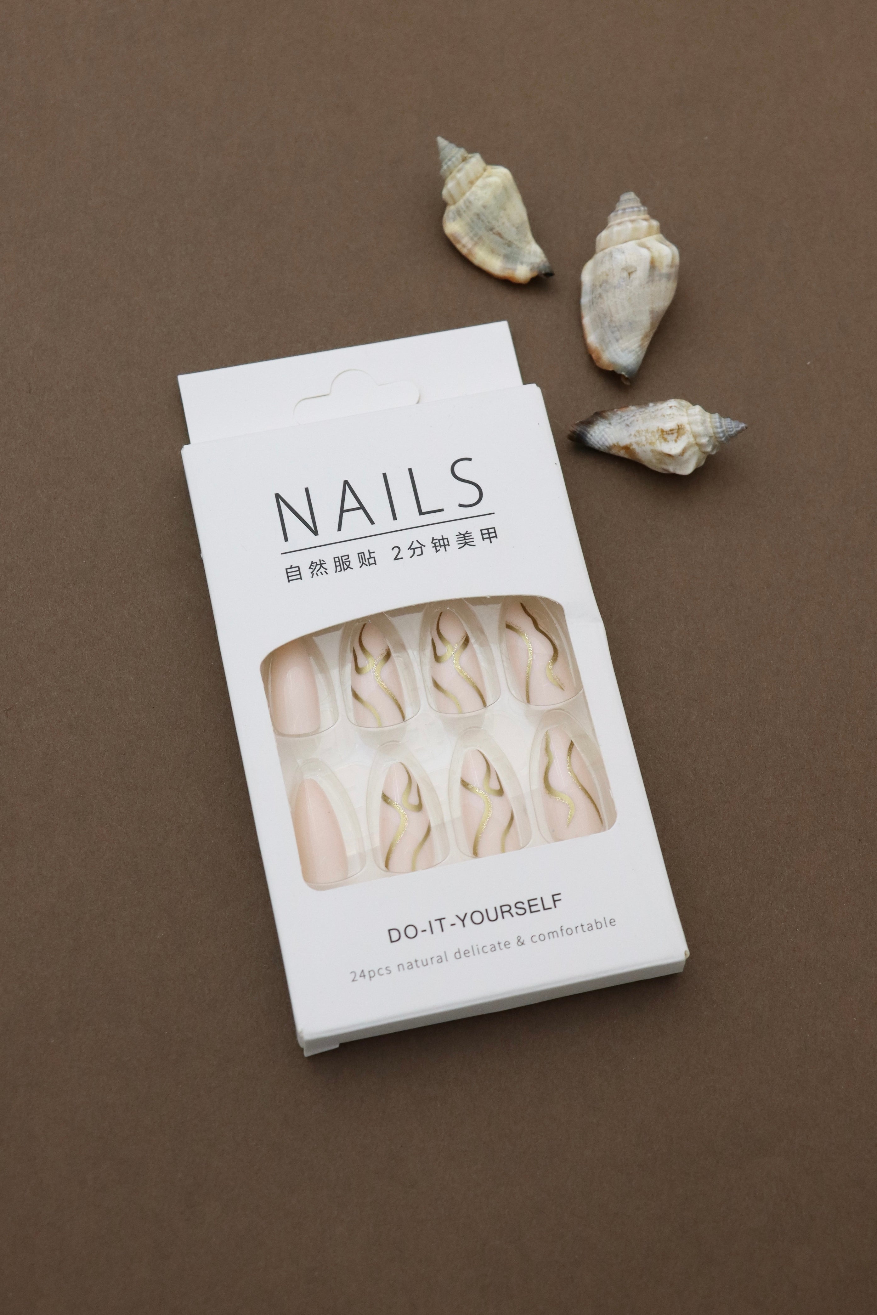 Sophisticated Nude Almond Press-On Nails with Gold Wavy Accent Design - 24pcs Set