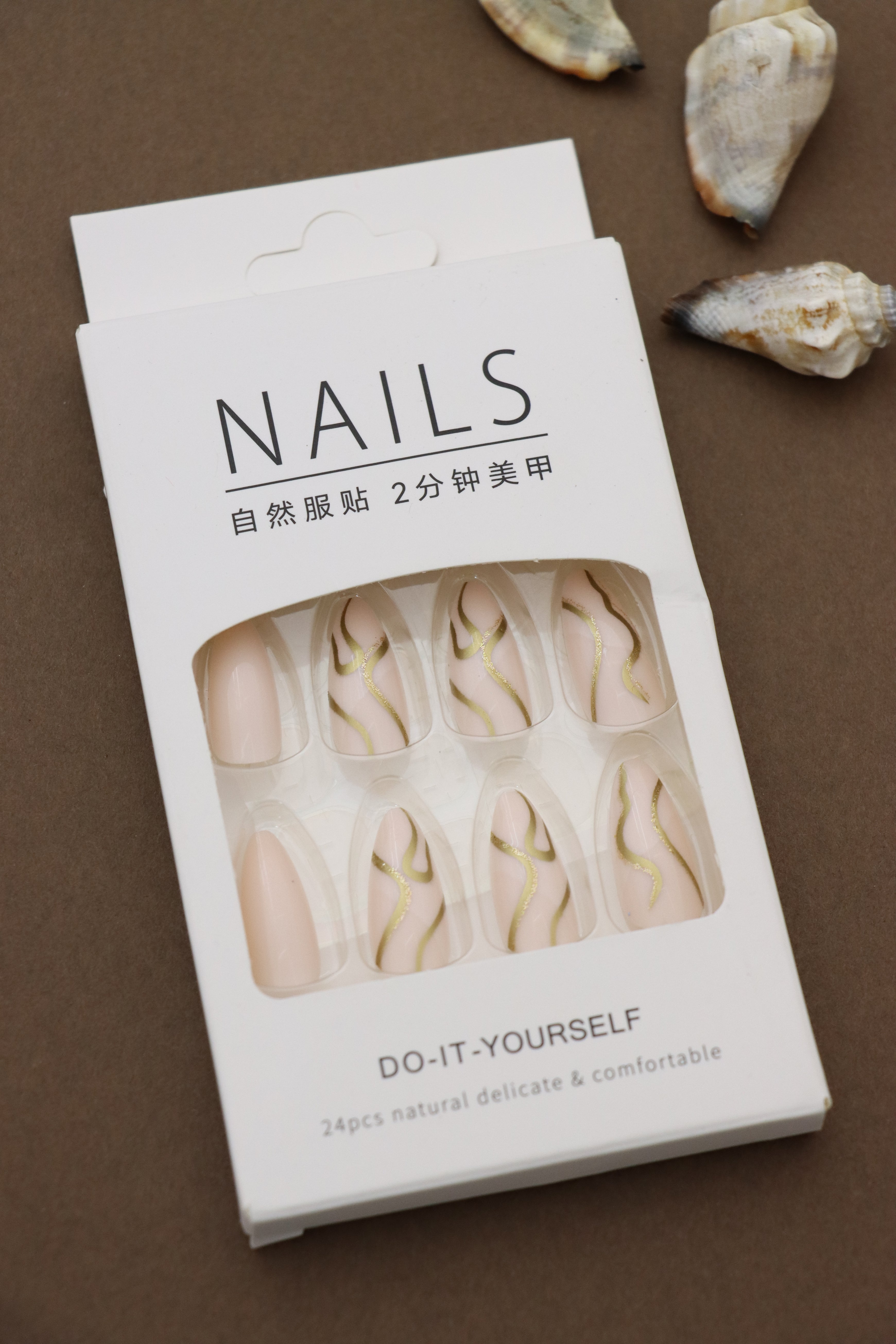 Sophisticated Nude Almond Press-On Nails with Gold Wavy Accent Design - 24pcs Set