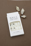 Elegant White Press-On Nails with Grey Floral and Gold Glitter Accents - 24pcs Natural and Comfortable Nail Set
