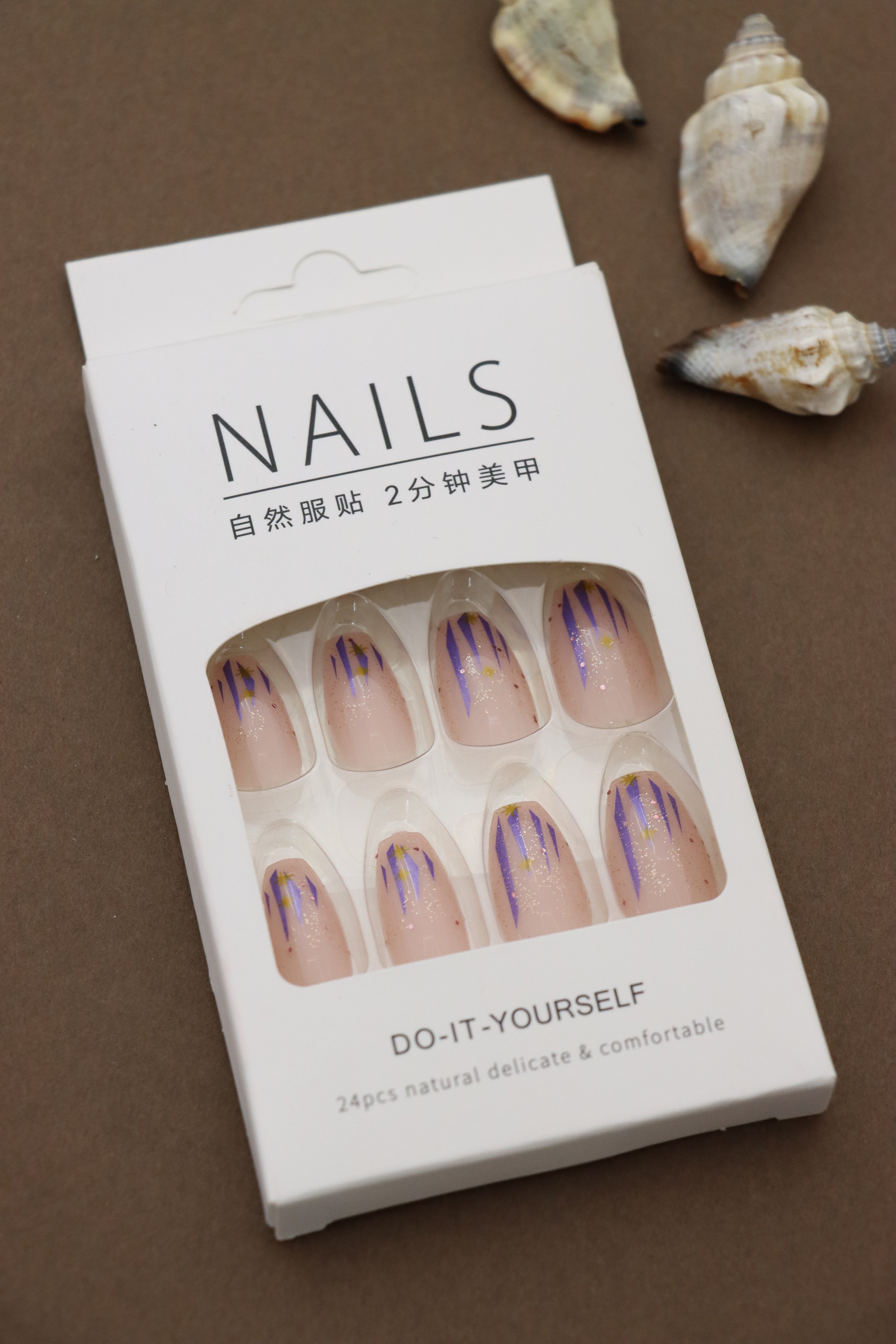 Sparkling Pink Press-On Nails with Blue and Gold Stardust Design – Celestial Glam