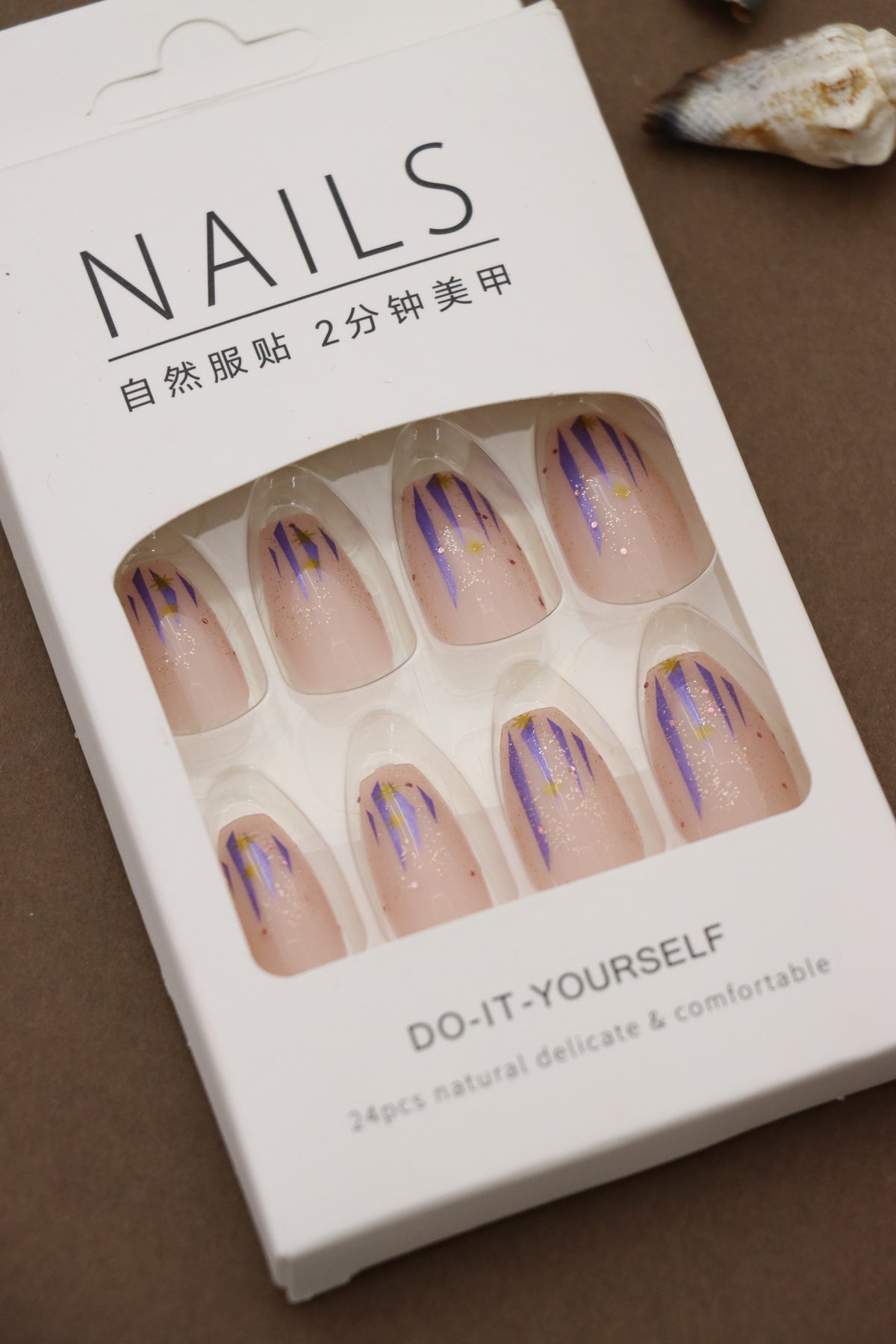 Sparkling Pink Press-On Nails with Blue and Gold Stardust Design – Celestial Glam