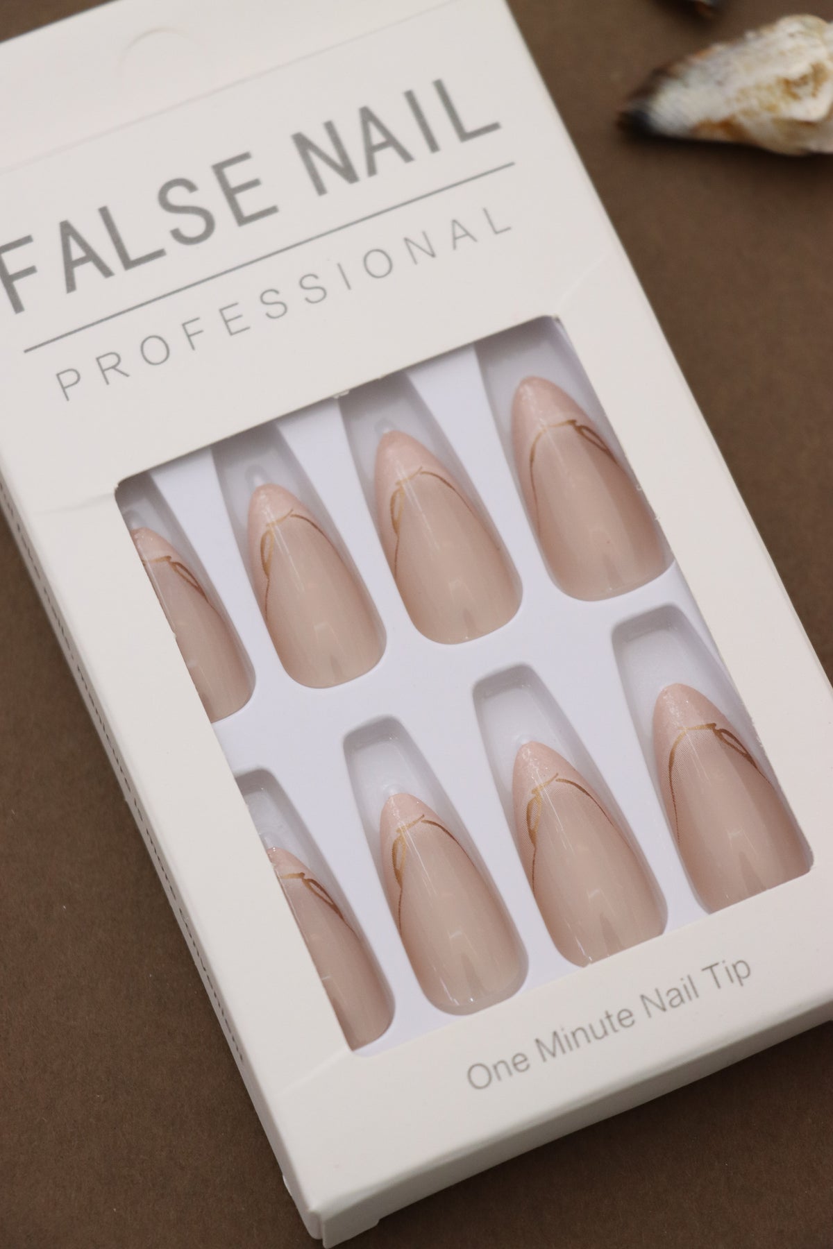 Nude Pink Almond Press-On Nails with Subtle Gold Accent – Elegant Charm