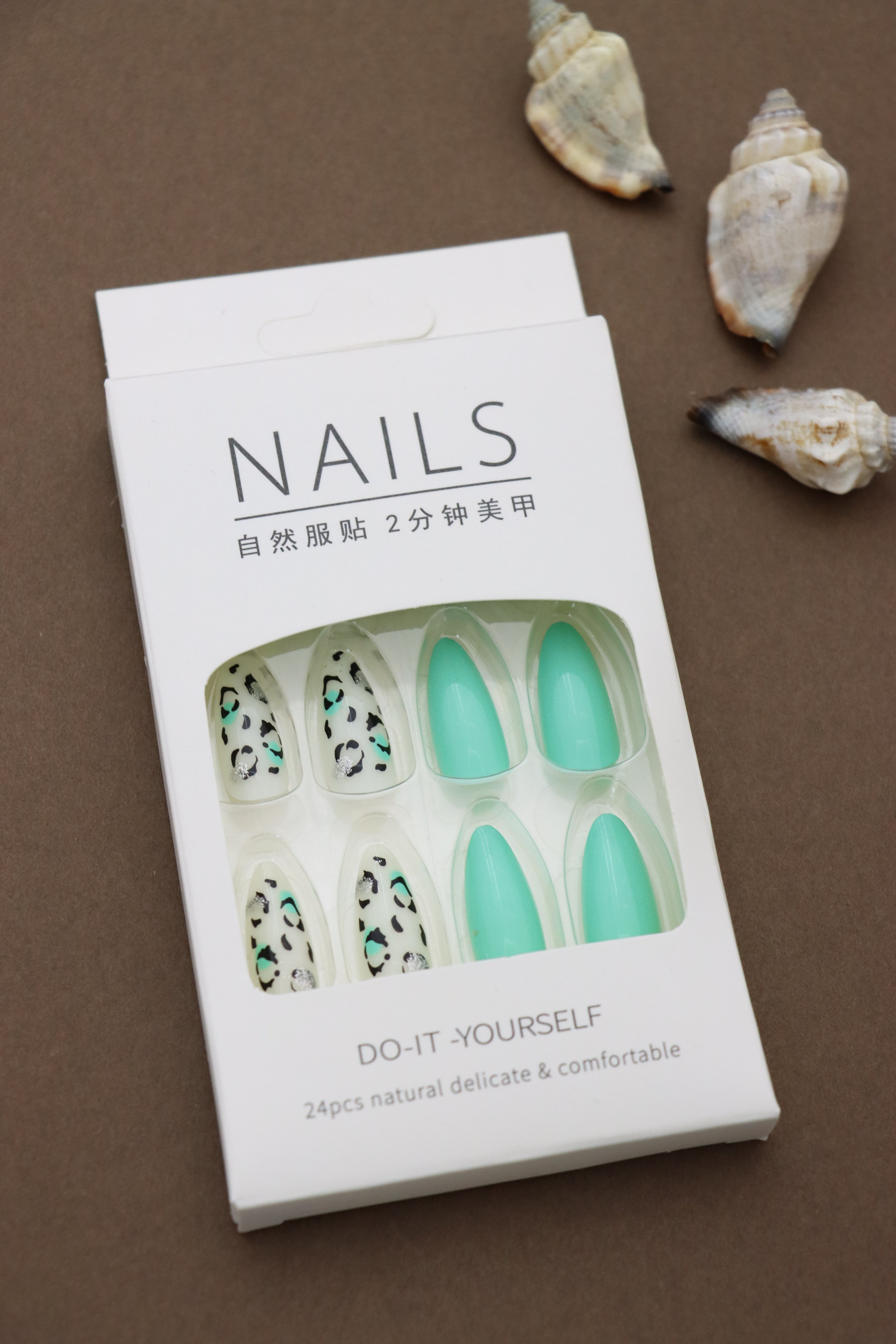 Wild Elegance: Mint Green Nails Paired with Chic Leopard Print for a Bold, Fashion-Forward Look!