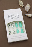 Wild Elegance: Mint Green Nails Paired with Chic Leopard Print for a Bold, Fashion-Forward Look!