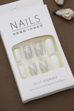 Minimalist White and Silver Press-On Nails – Subtle Elegance with Leafy Accent Design