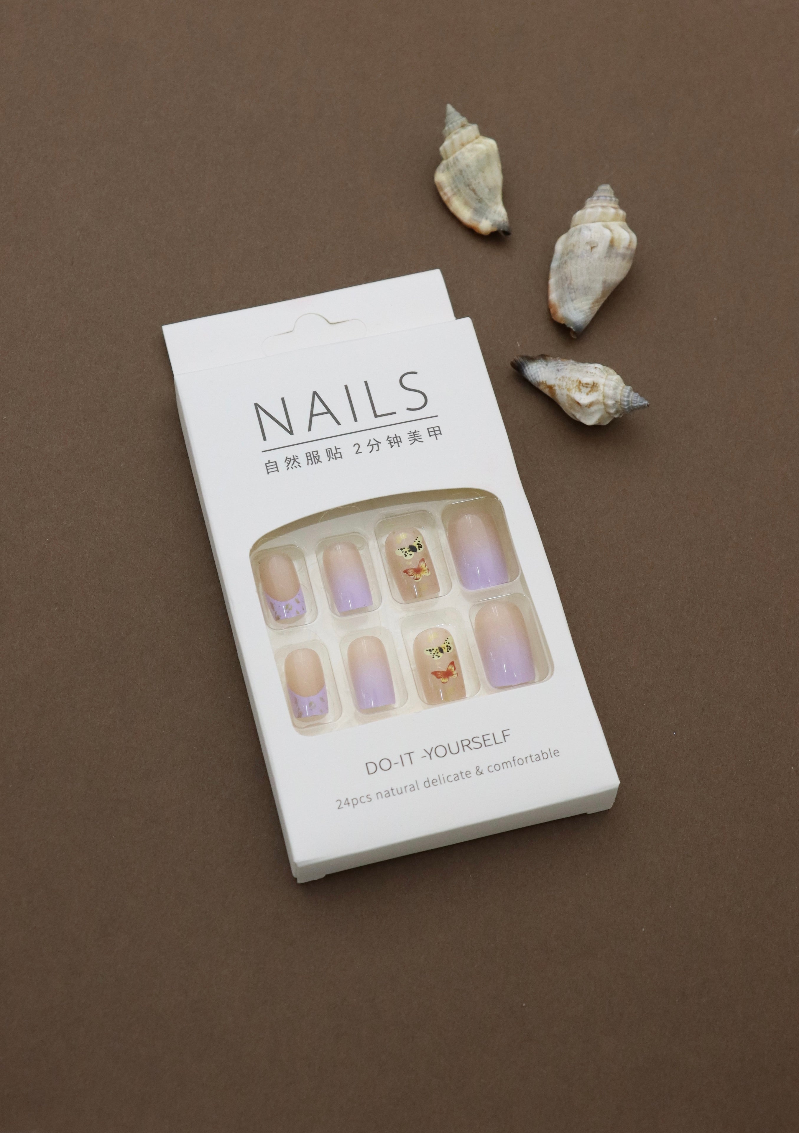Ethereal Butterfly Elegance: Grace Your Fingertips with a Soft Gradient and Delicate Butterfly Designs. Perfect for a Chic and Whimsical Look!