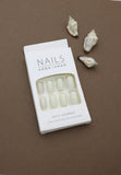 Pearlescent White Press-On Nails with Glitter Accents – Classic Elegance