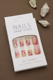 Playful Pink Press-On Nails – Floral, Eyelash, and Heart Accents for a Fun and Whimsical Look