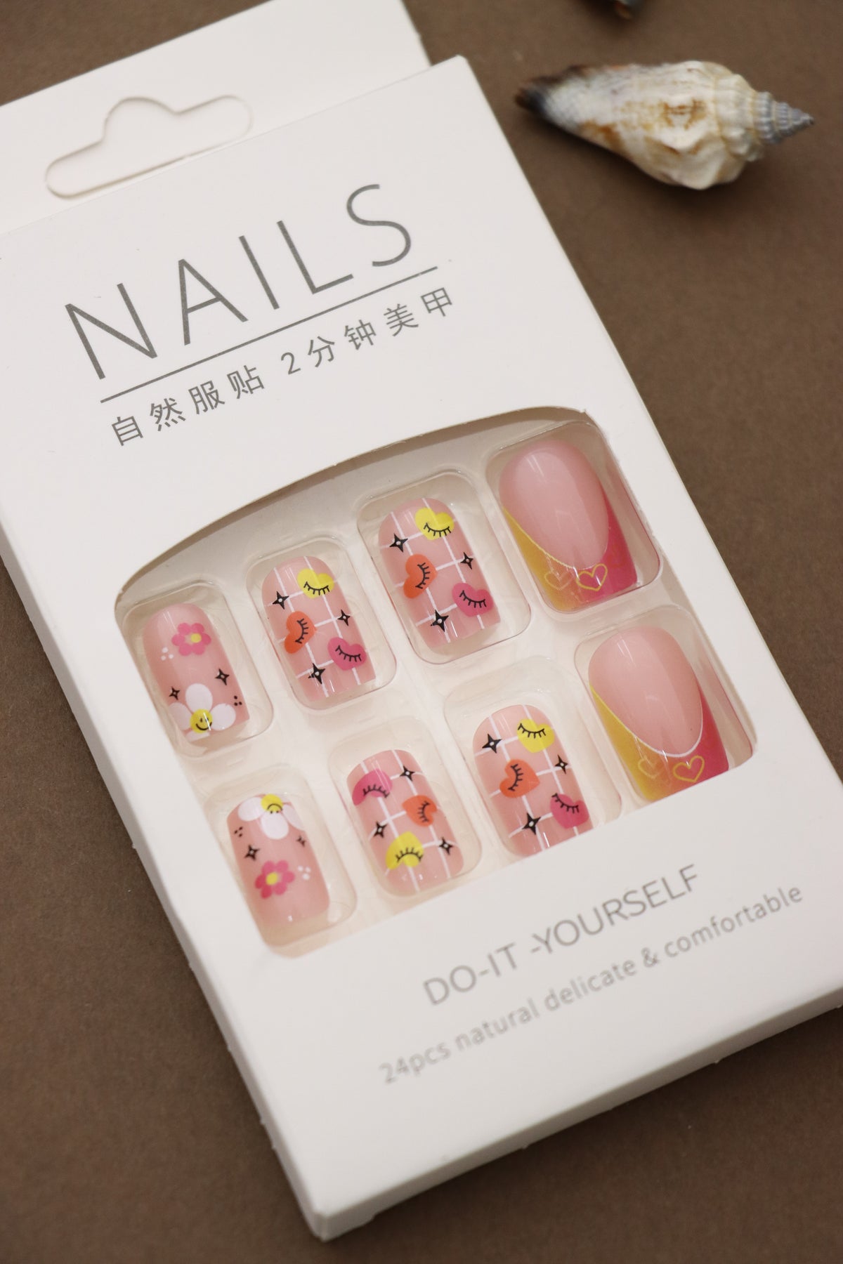 Playful Pink Press-On Nails – Floral, Eyelash, and Heart Accents for a Fun and Whimsical Look