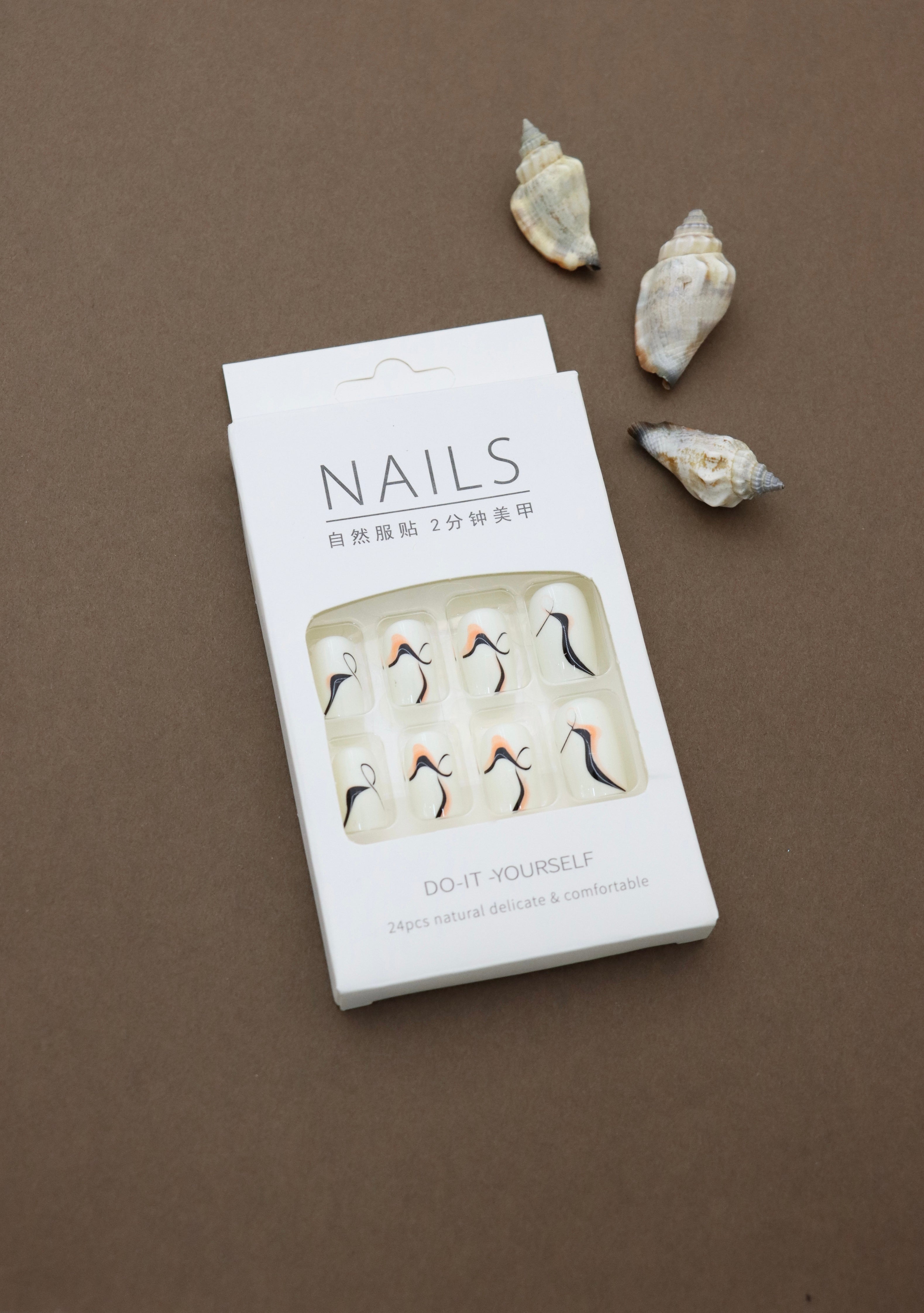Ivory Abstract Wave Press-On Nails - Sophisticated Swirls in Black & Peach Accents