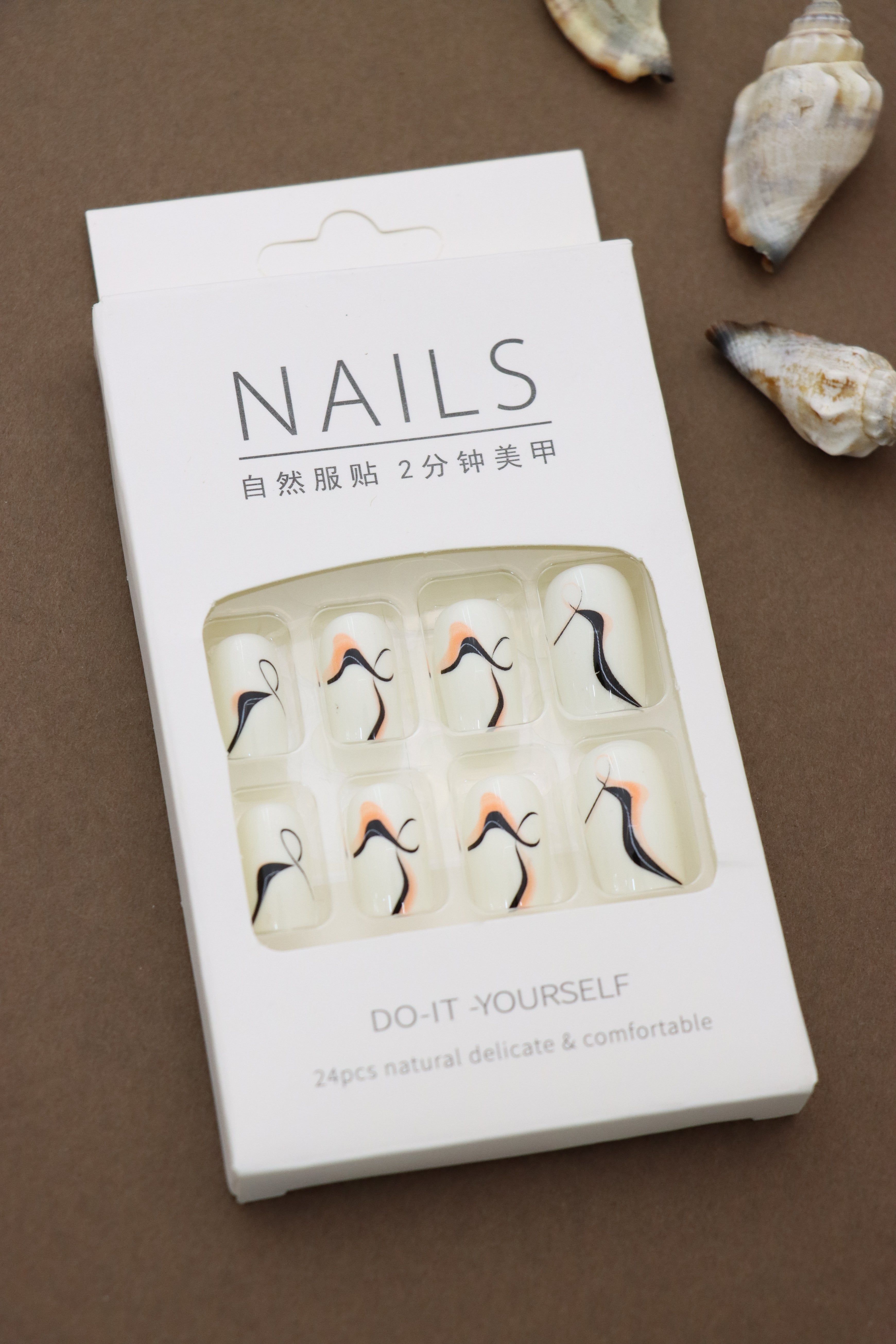 Ivory Abstract Wave Press-On Nails - Sophisticated Swirls in Black & Peach Accents