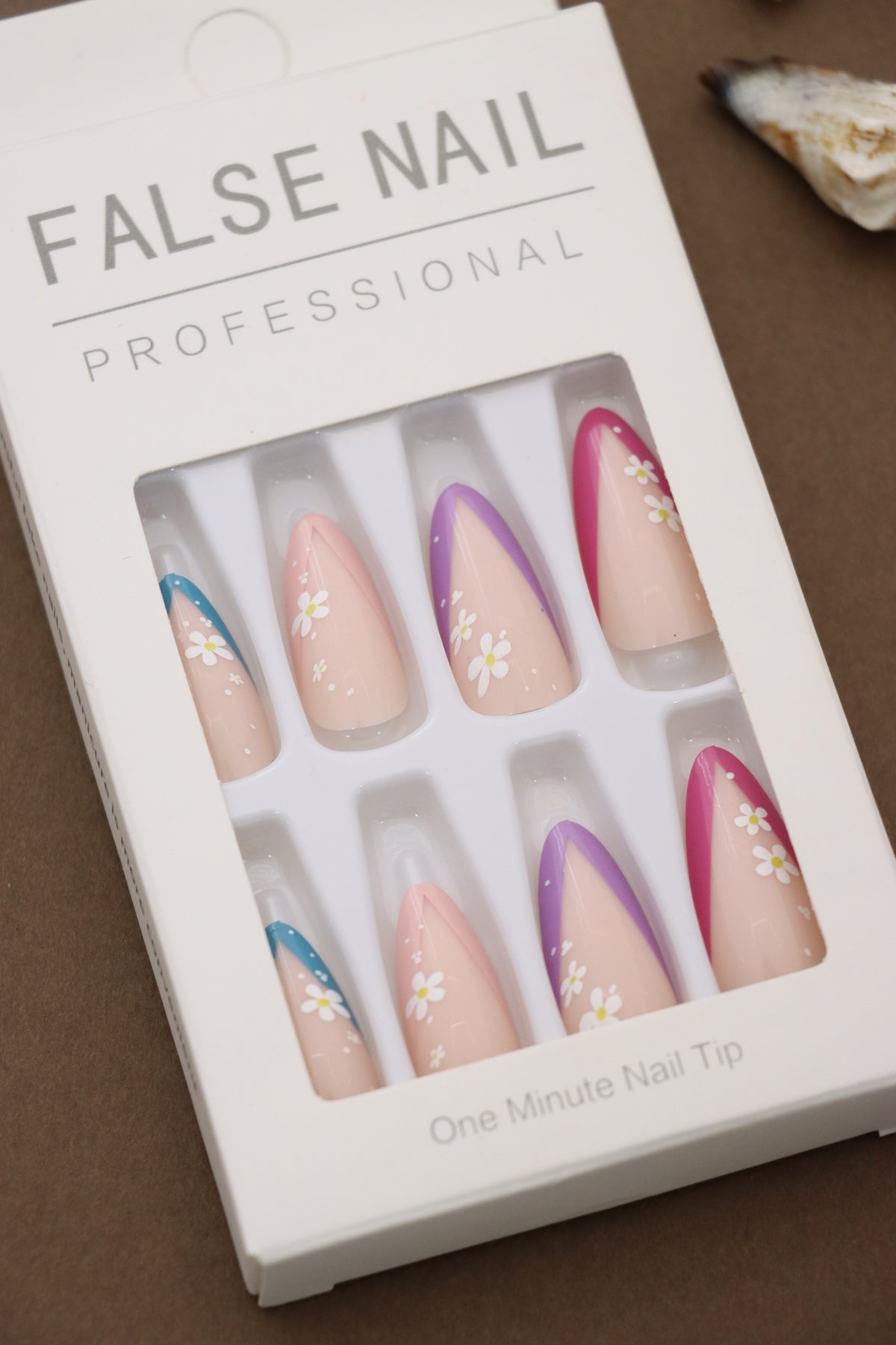 Vibrant Daisy French Tips – A Playful Blend of Pastel Shades and Delicate Floral Art. Perfect for Adding a Pop of Color to Your Look. Experience Style and Comfort with These Professional Nail Tips.