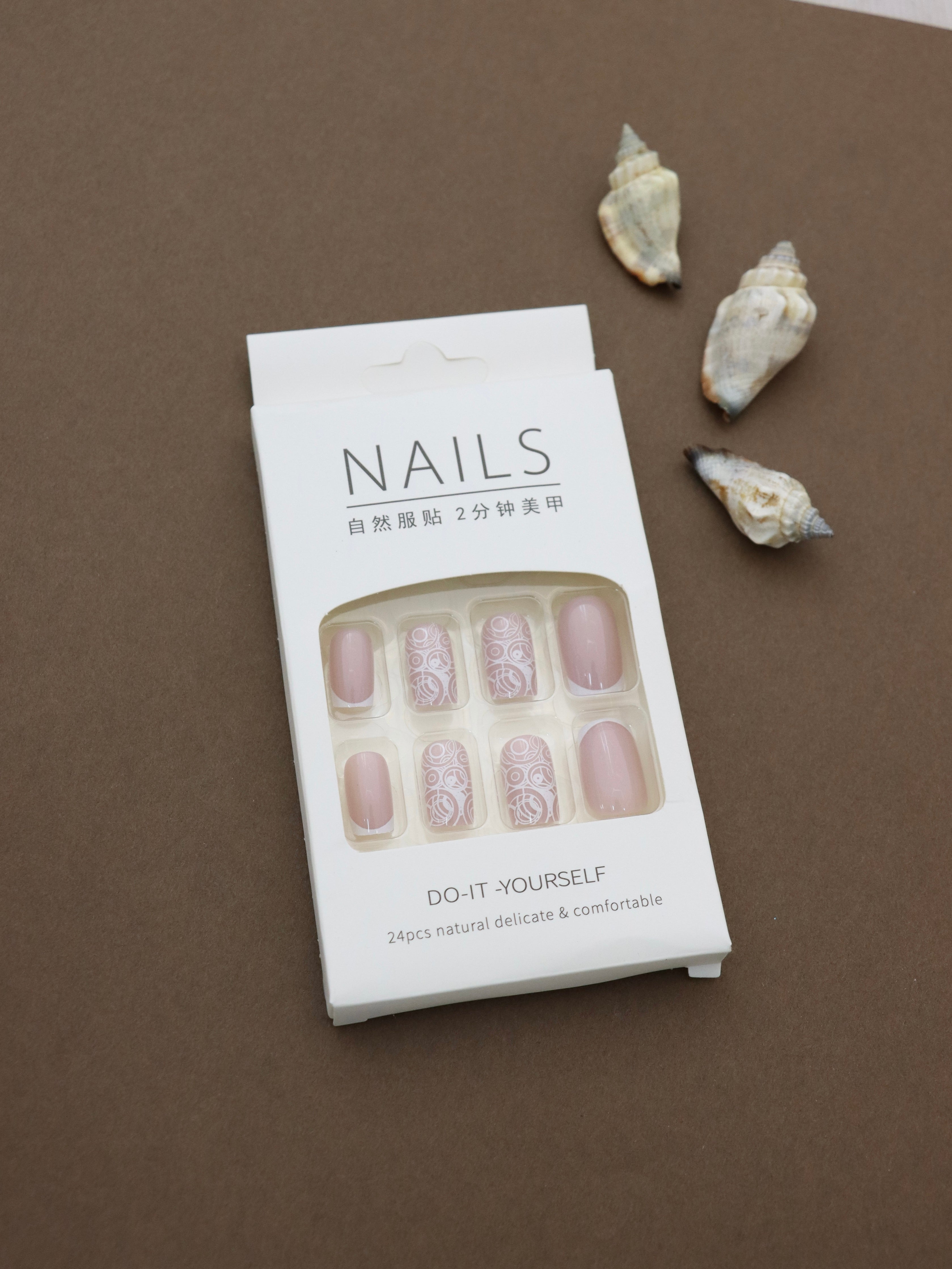 Elegant Swirls Press-On Nails - 24pcs DIY Set with Soft Nude Base and Intricate White Circular Patterns for a Sophisticated Look