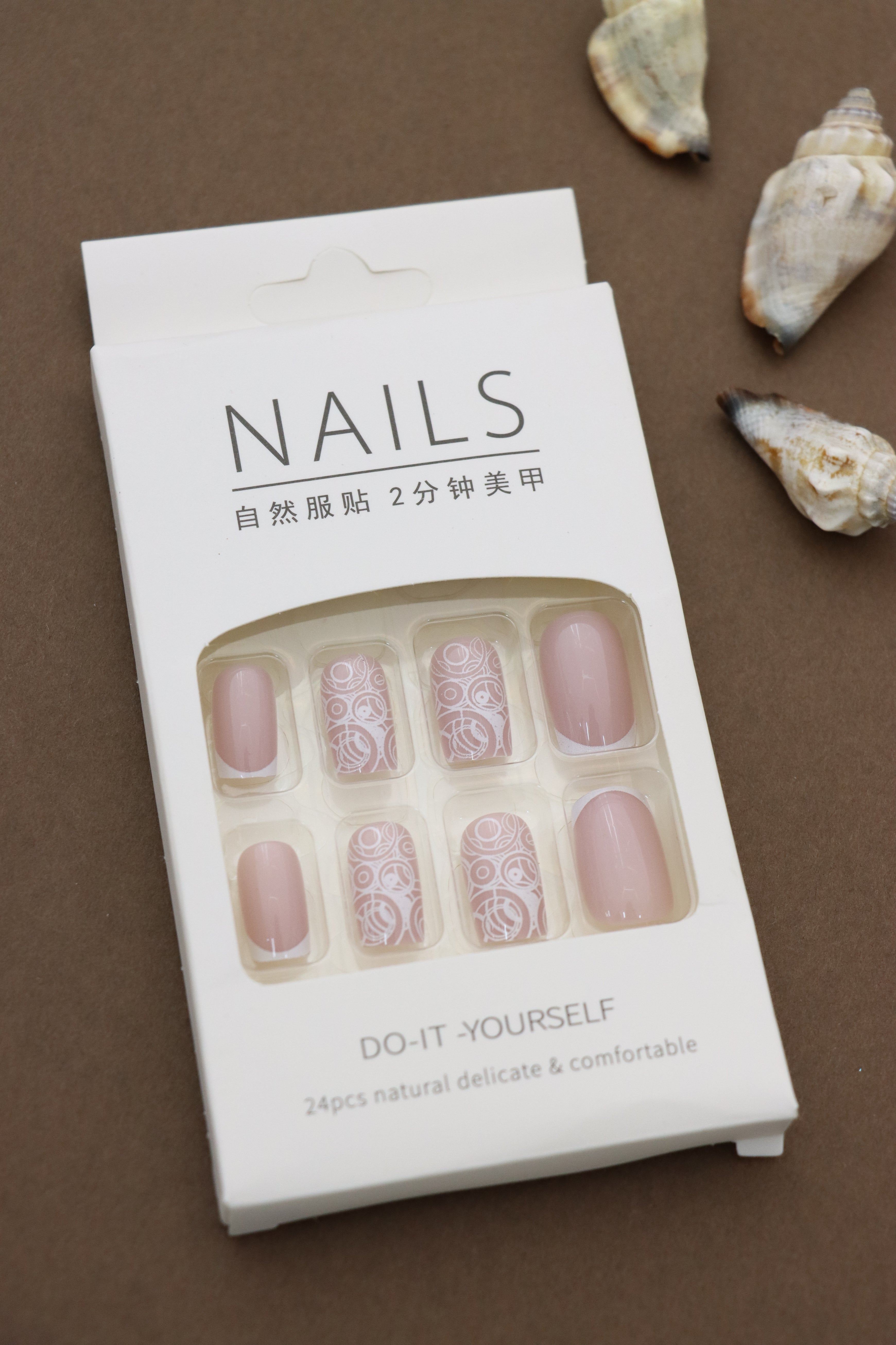 Elegant Swirls Press-On Nails - 24pcs DIY Set with Soft Nude Base and Intricate White Circular Patterns for a Sophisticated Look