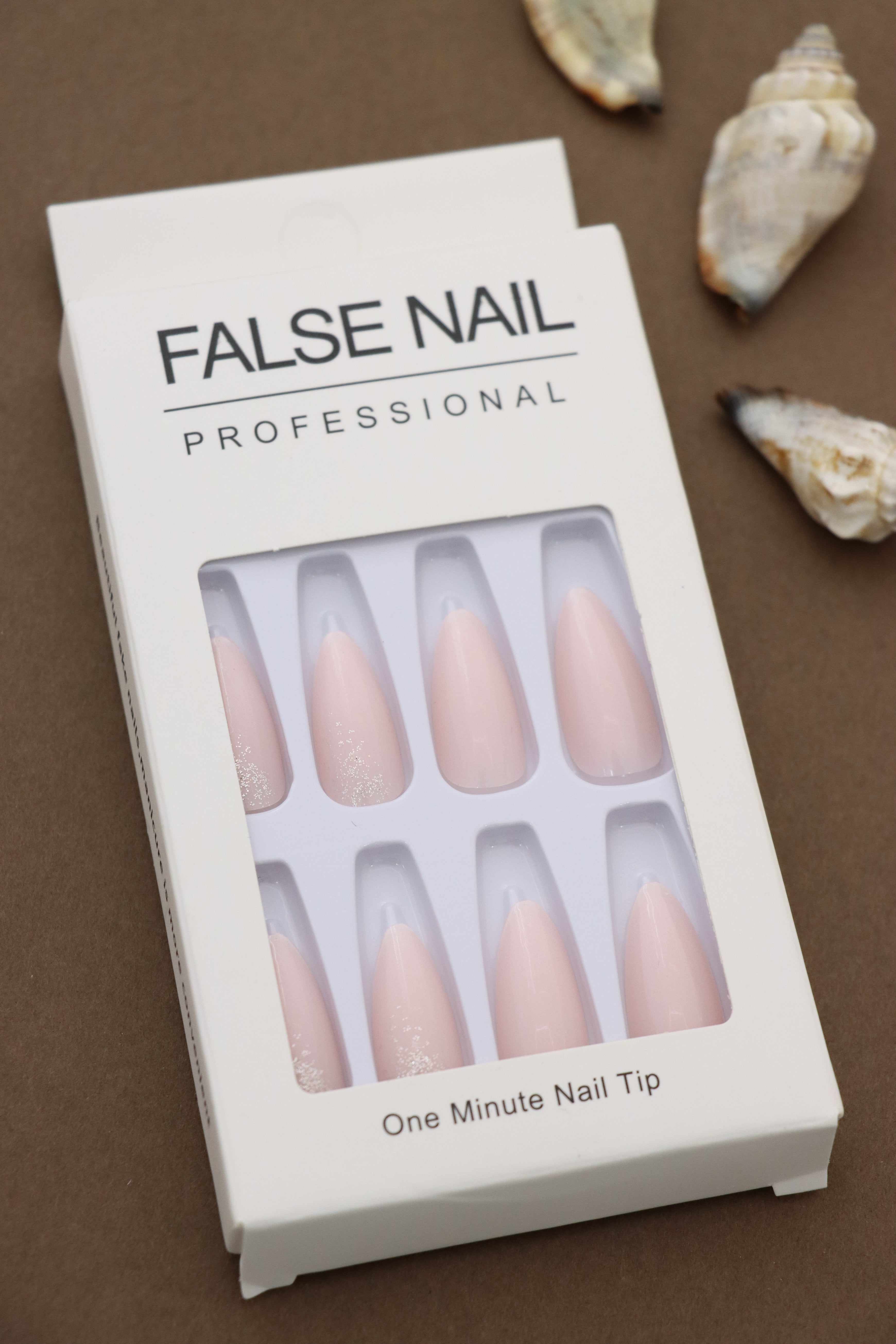 Embrace simplicity and elegance with these minimalist blush pink stiletto nails. Perfect for any occasion, their subtle shimmer adds just the right touch of sophistication.
