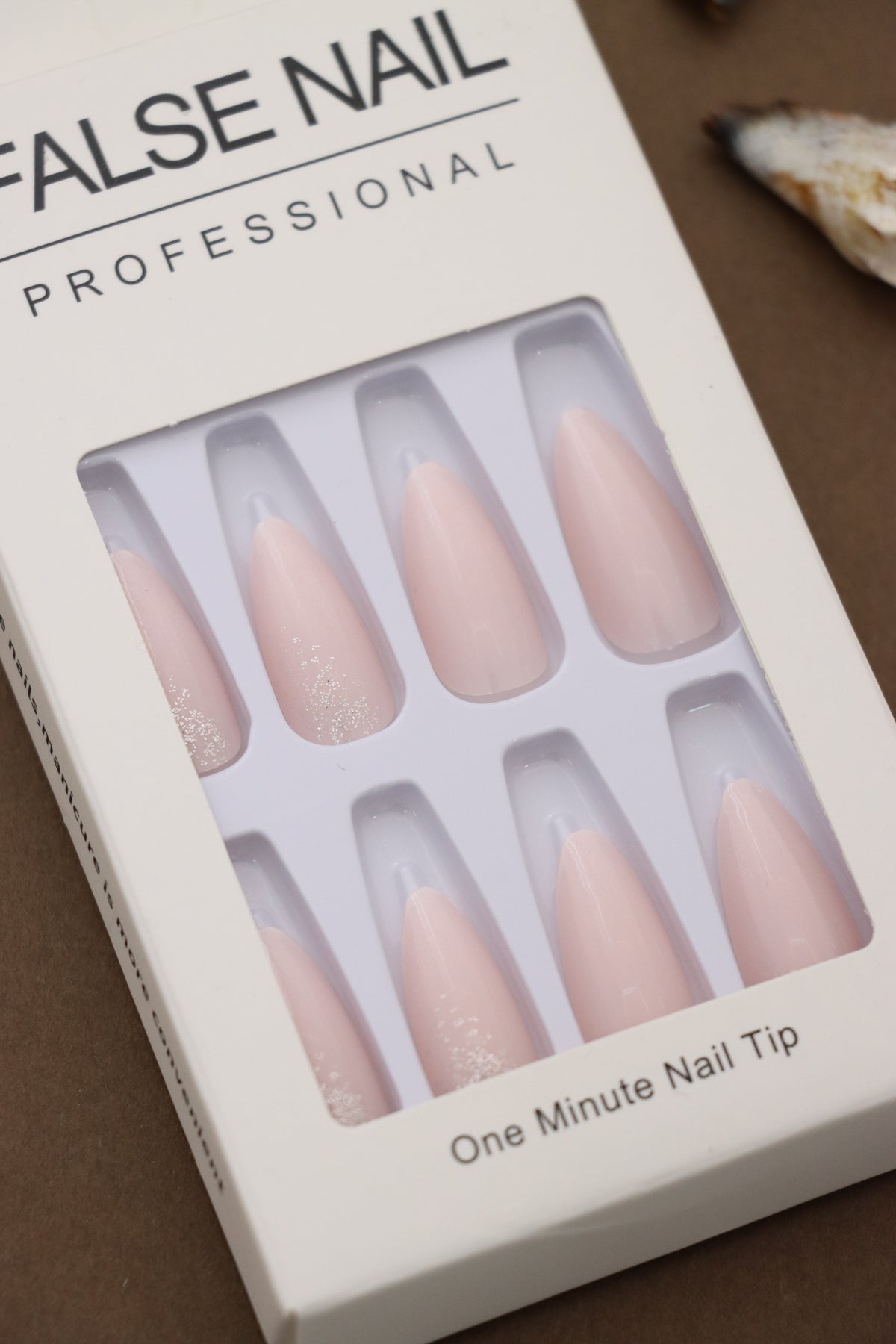 Embrace simplicity and elegance with these minimalist blush pink stiletto nails. Perfect for any occasion, their subtle shimmer adds just the right touch of sophistication.
