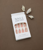 Sweeten your style with these heart-accented press-on nails! Featuring a soft pink base and playful white hearts, they’re the perfect accessory for a romantic and trendy look.