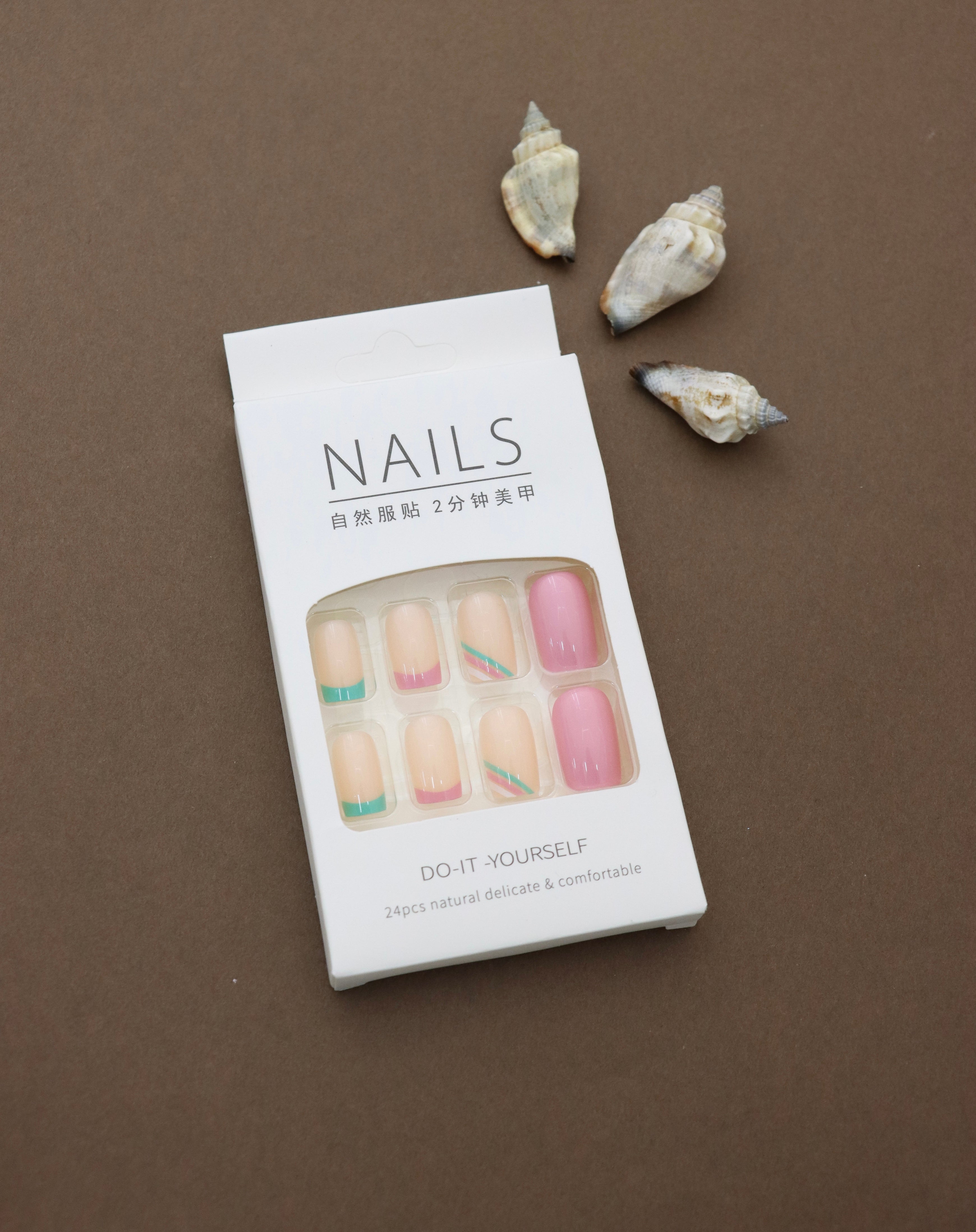 Pastel Perfection: Soft Beige Nails with Colorful Pink and Teal Accents – The Ultimate Blend of Subtlety and Style!