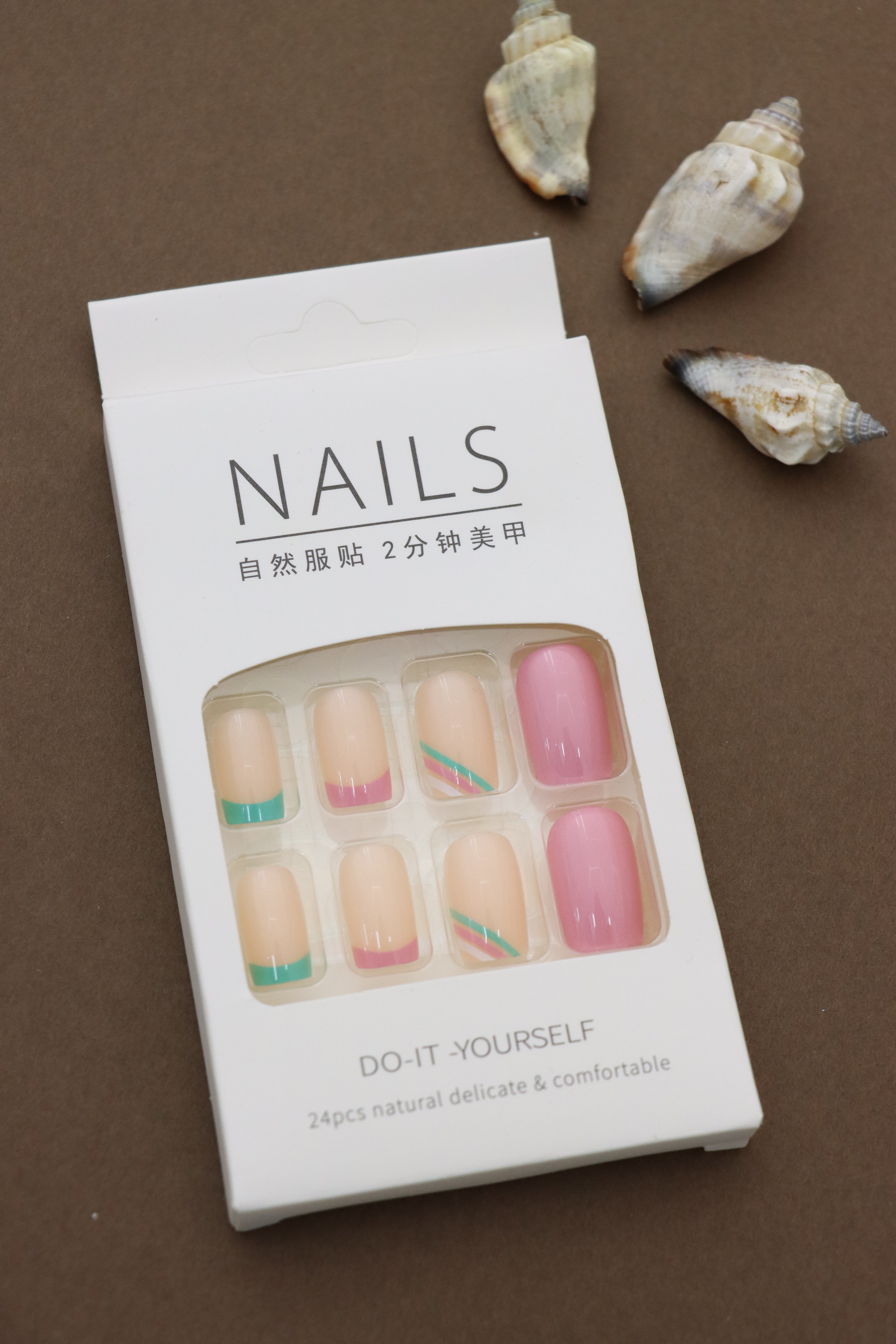 Pastel Perfection: Soft Beige Nails with Colorful Pink and Teal Accents – The Ultimate Blend of Subtlety and Style!